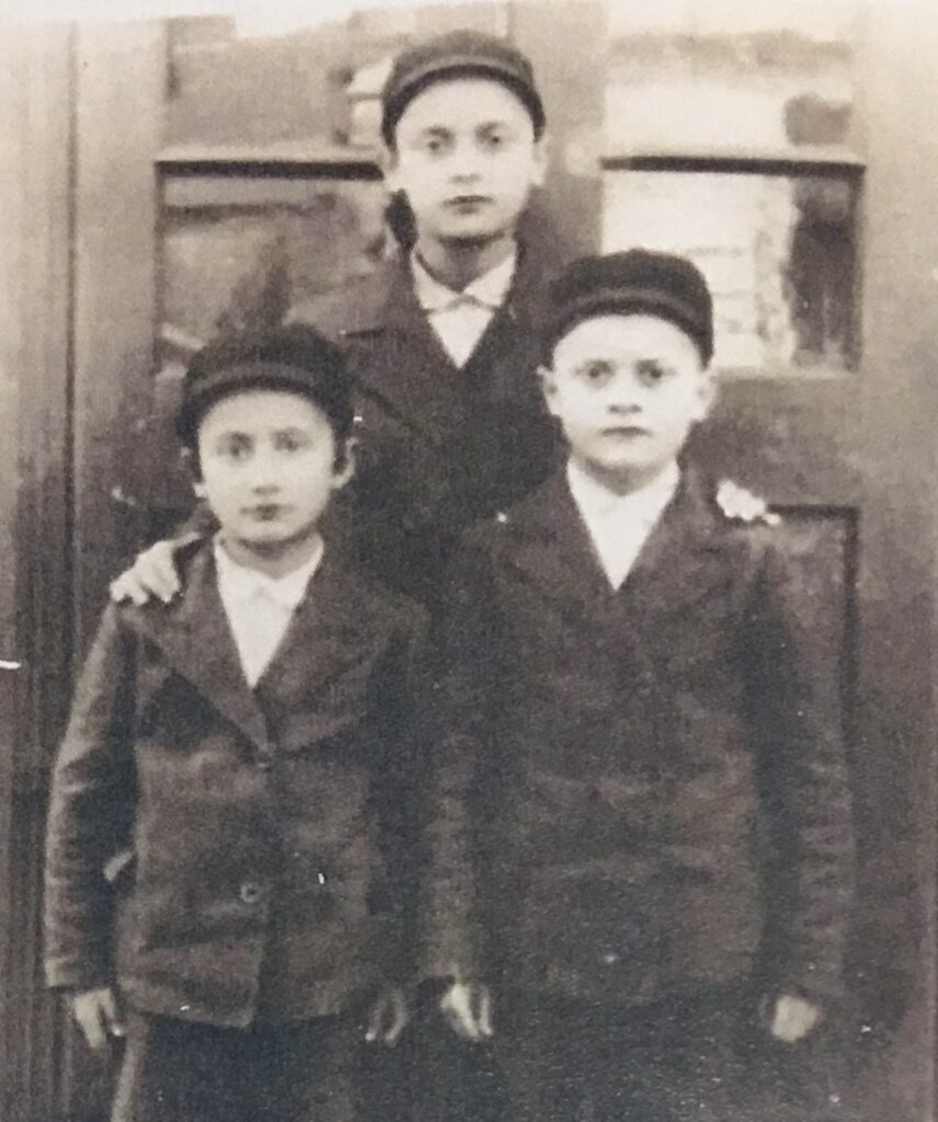 Photograph of Pnchas Hebel (right) with his older brother and younger brother