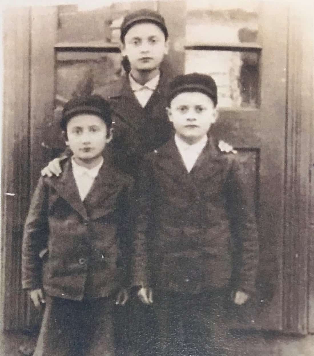 Photograph of Hebel on the right with brothers: Abraham, behind, and Mendel on the left.