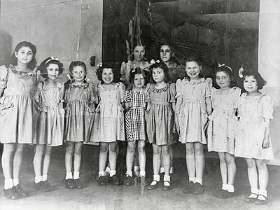 Photograph of Front L to R: Hedy Friedman, Zdenka Husserl, Mirjam Stern, Hanka Traub, Judith Singer, Tanja Muench, Ruth Kamaryth Sylvia Grüner and Eva Traub. Back row: Milly Schwarz, Magda Liberman.