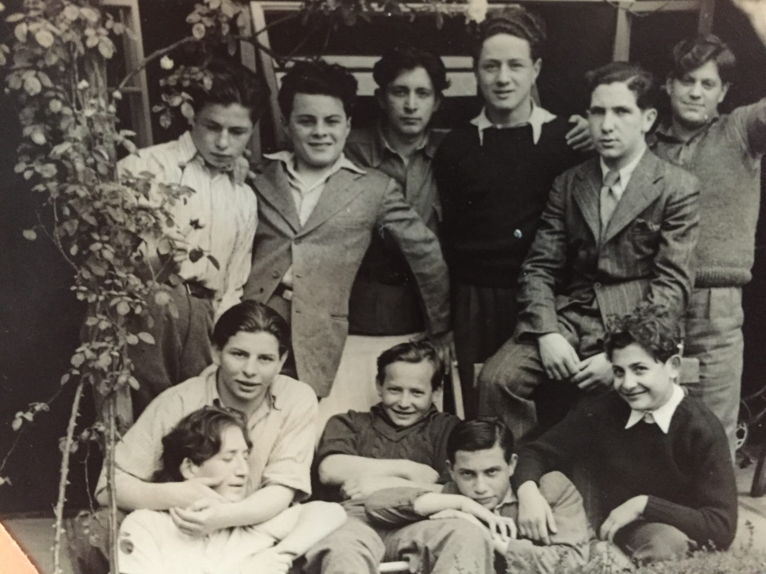 Photograph of Standing far right back, Michael Novice, in front sitting, Michael Preston, front row 1st left, Aron Zylberszac and Alfred Huberman, Ashford, Kent 1946